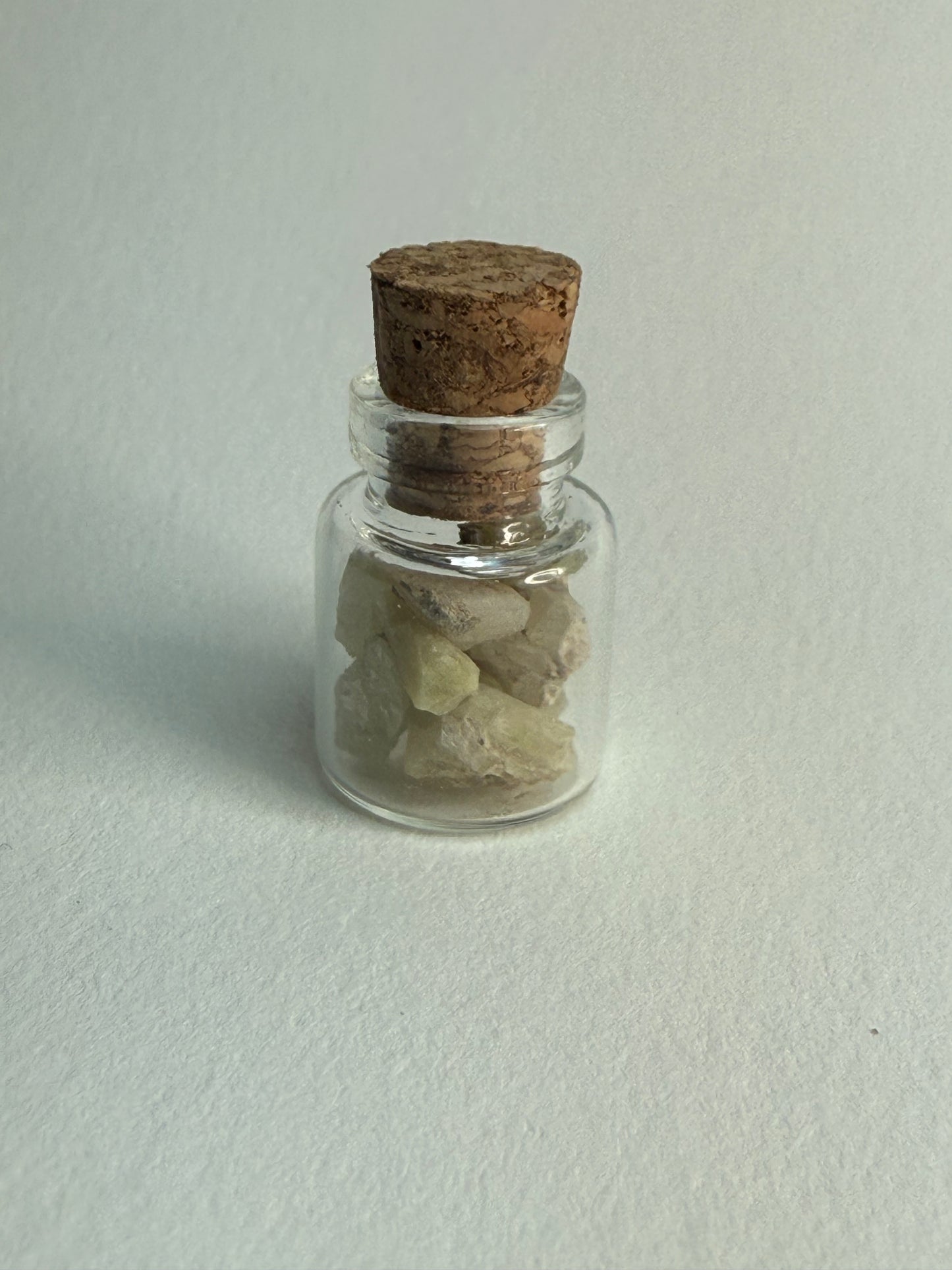 Small Bottle of Green Garnets